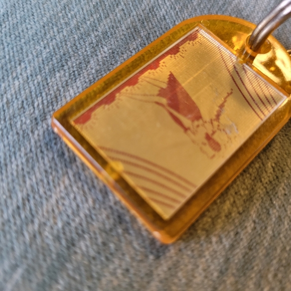 Picture Changing Keychain - Lady Changing Clothes Jewelry Store Ho Phone Cary NC - Picture 3 of 12